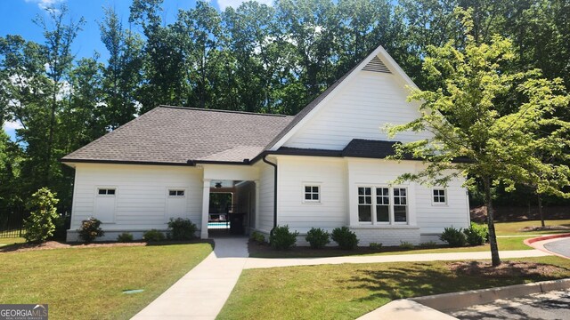 2903 Eva Clb, Acworth, GA 30101 - view of front of property with a front yard and roof with shingles