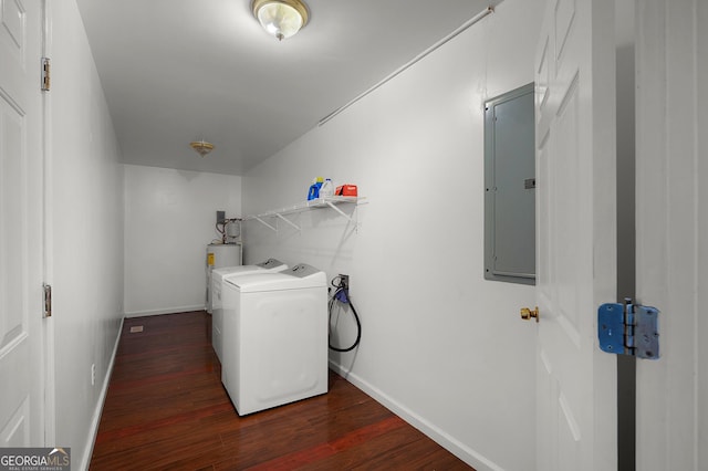 laundry room with wood finished floors, separate washer and dryer, laundry area, electric panel, and baseboards