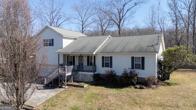 view of front facade with a porch and a front yard