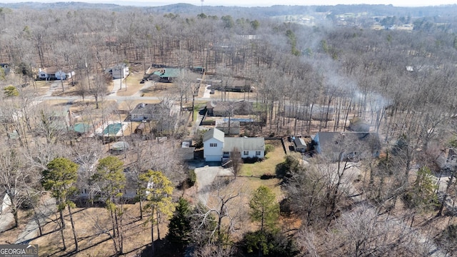 aerial view featuring a forest view