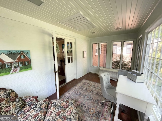 sunroom / solarium with french doors and wooden ceiling