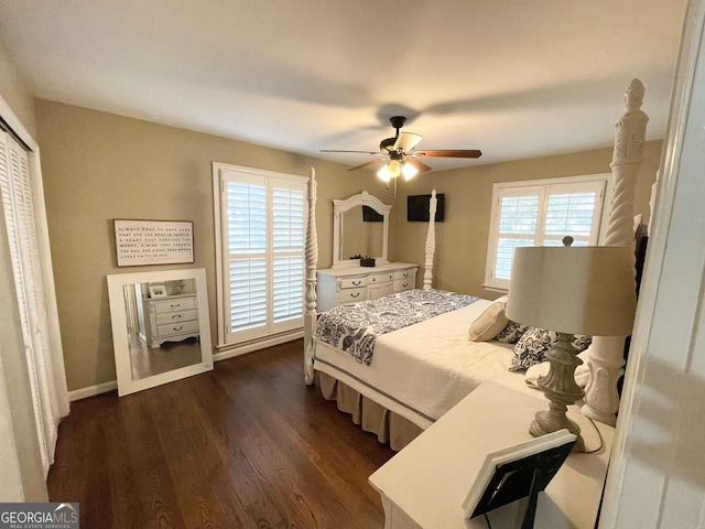 bedroom with ceiling fan, a closet, baseboards, and dark wood-style flooring