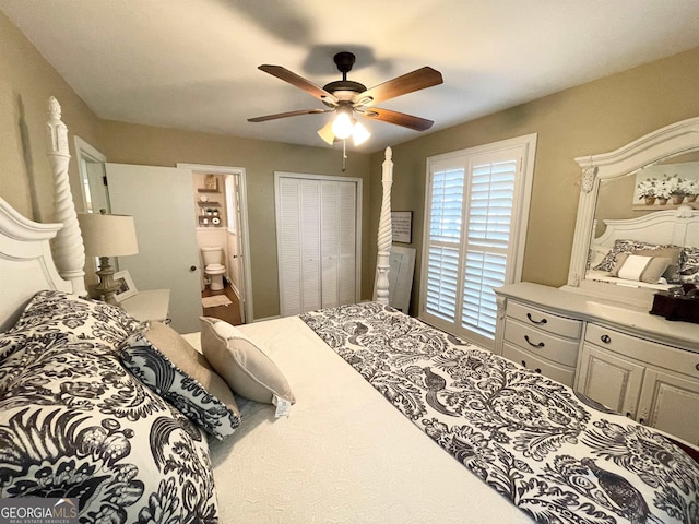 bedroom with ceiling fan, a closet, and ensuite bath