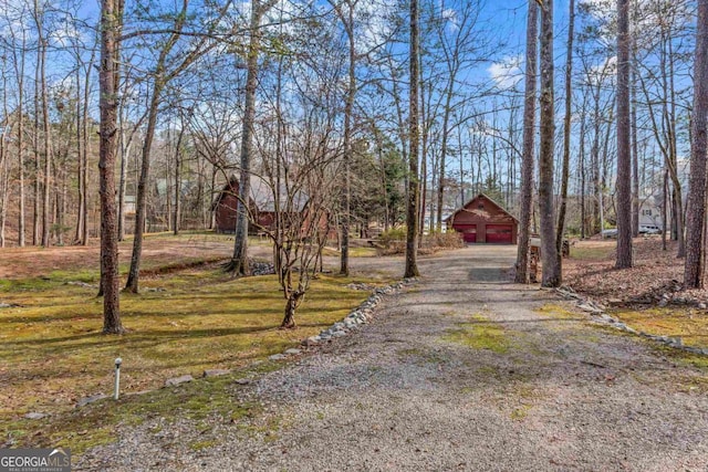 view of road with driveway