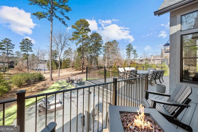 balcony featuring a fire pit