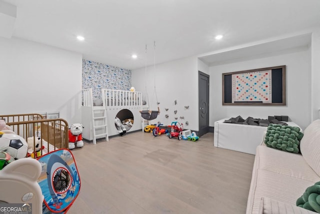 interior space with recessed lighting and light wood-style flooring