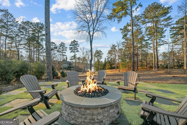 view of patio / terrace featuring a fire pit