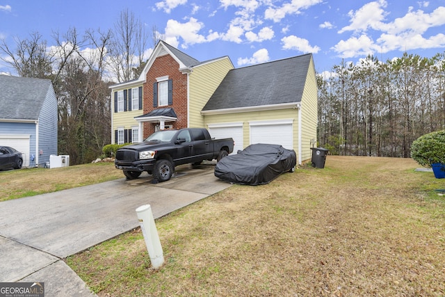 view of home's exterior featuring roof with shingles, brick siding, a lawn, a garage, and driveway