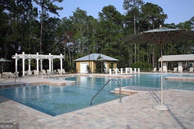 community pool featuring a patio and a pergola