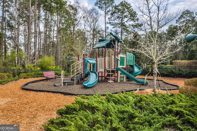 community playground featuring fence