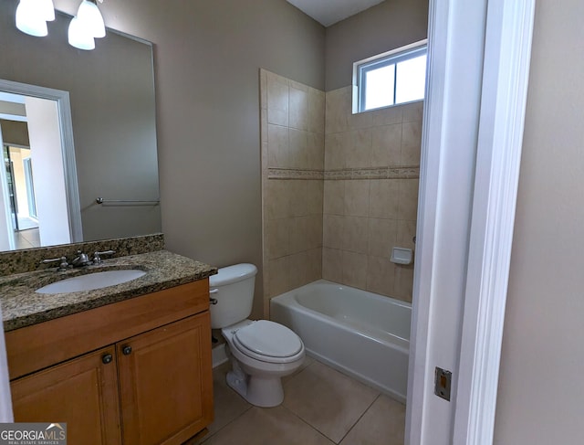 bathroom with toilet, tile patterned flooring, washtub / shower combination, and vanity