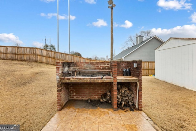 exterior space with a fenced backyard