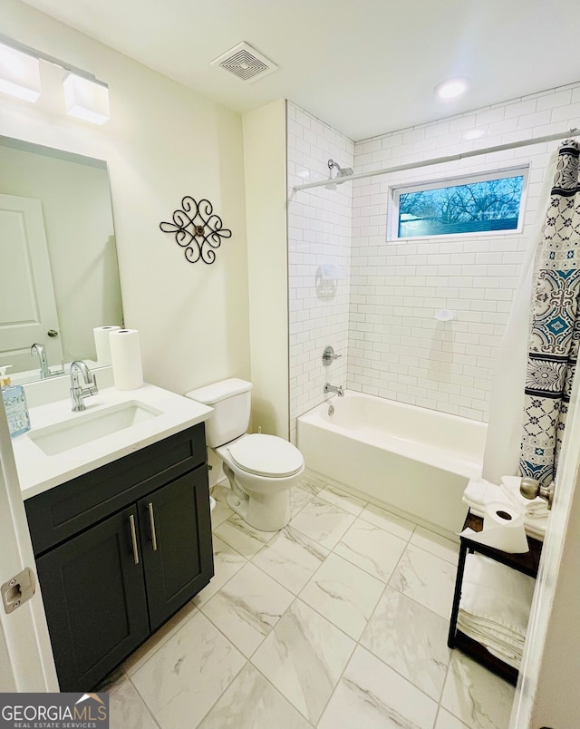 bathroom with marble finish floor, visible vents, shower / bathing tub combination, toilet, and vanity