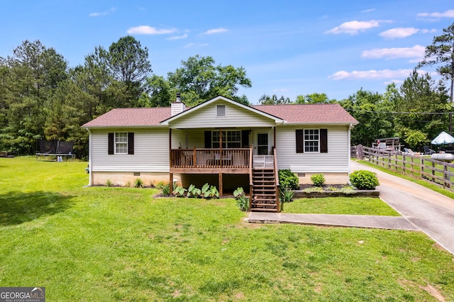 ranch-style home with a trampoline, crawl space, a chimney, and stairway