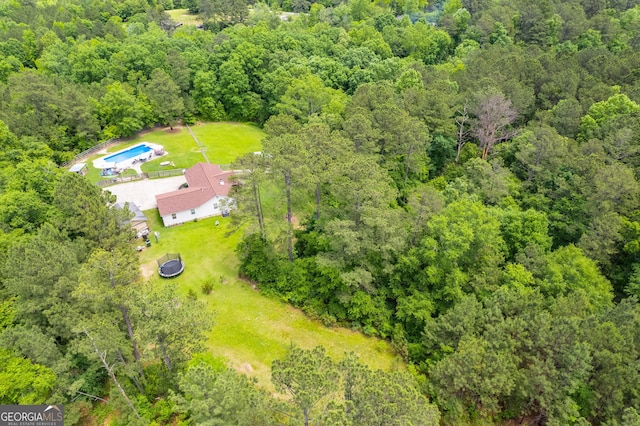 aerial view featuring a view of trees