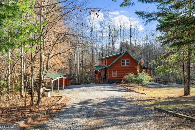 exterior space with gravel driveway