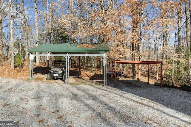 view of parking / parking lot with a carport