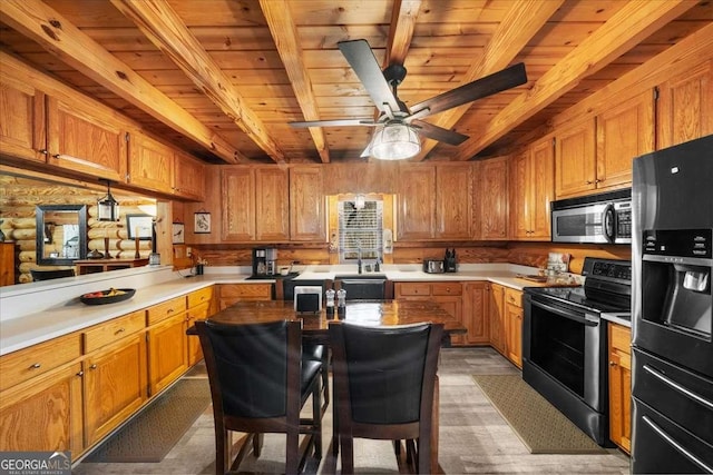 kitchen featuring light countertops, beam ceiling, electric range oven, black refrigerator with ice dispenser, and stainless steel microwave