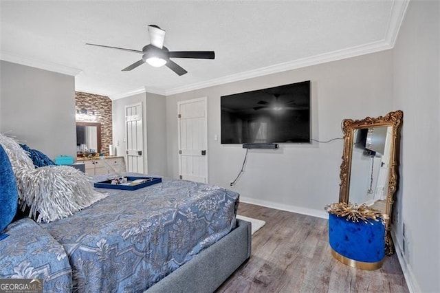 bedroom featuring a ceiling fan, baseboards, ornamental molding, and wood finished floors