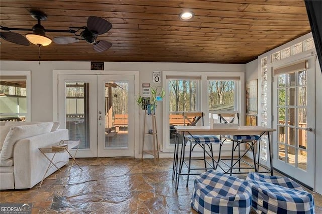 unfurnished sunroom with french doors and wooden ceiling