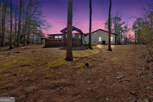 exterior space with a deck and a gazebo