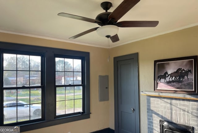 doorway to outside featuring electric panel, a fireplace, and crown molding