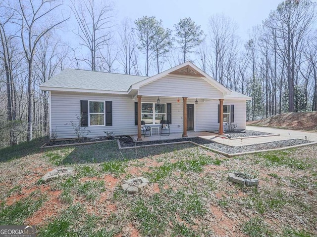 ranch-style home with covered porch