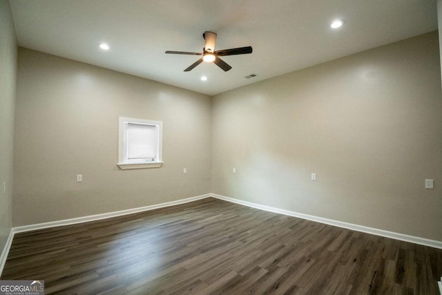 empty room featuring visible vents, baseboards, a ceiling fan, dark wood-type flooring, and recessed lighting