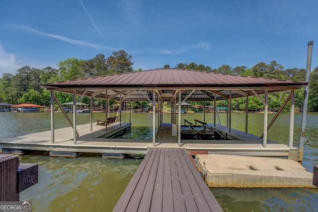 71 Canvasback Ct, Monticello, GA 31064 - dock area with boat lift and a water view