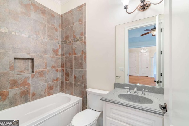 full bathroom featuring bathtub / shower combination, vanity, toilet, and a ceiling fan