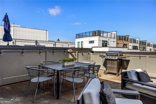 view of patio featuring outdoor dining space and area for grilling