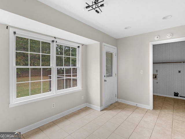 interior space featuring a wealth of natural light and baseboards