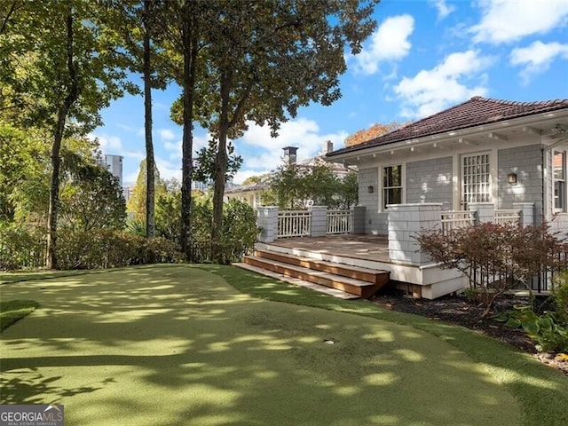 exterior space featuring a wooden deck