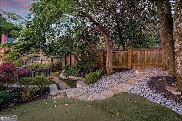 view of yard featuring a fenced backyard