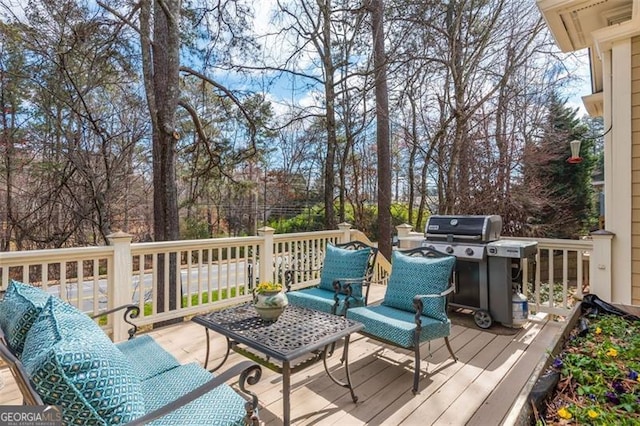 wooden terrace with area for grilling