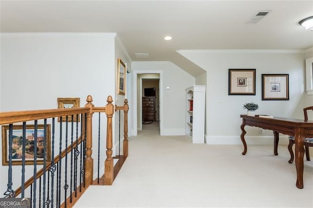 hallway with crown molding, visible vents, light carpet, an upstairs landing, and baseboards