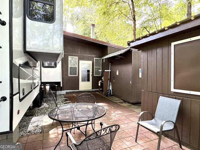 view of patio with outdoor dining space