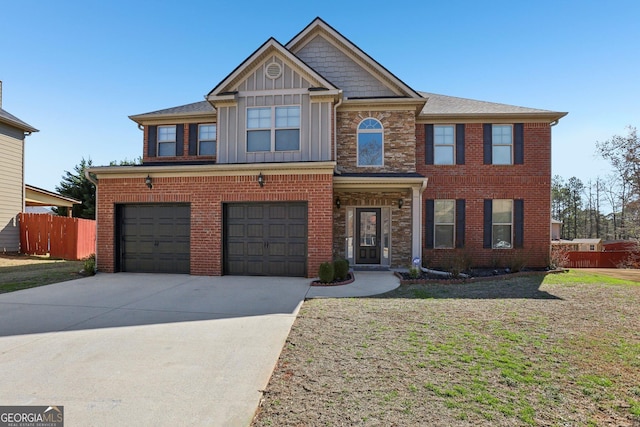 view of front of property with a garage, concrete driveway, brick siding, and board and batten siding