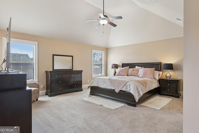 bedroom with high vaulted ceiling, light carpet, visible vents, and baseboards