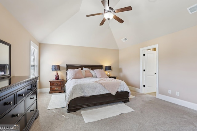 bedroom with high vaulted ceiling, visible vents, light carpet, and baseboards