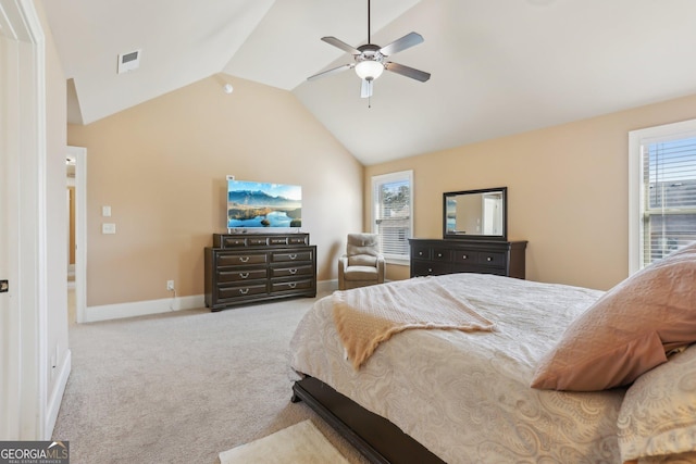 bedroom featuring lofted ceiling, light colored carpet, visible vents, ceiling fan, and baseboards