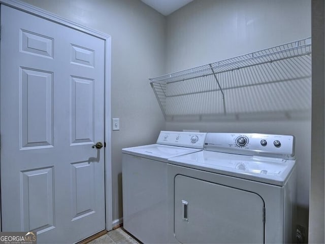 laundry area featuring laundry area and washer and dryer