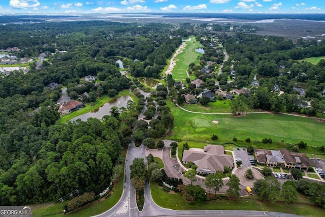 birds eye view of property featuring a water view and a residential view