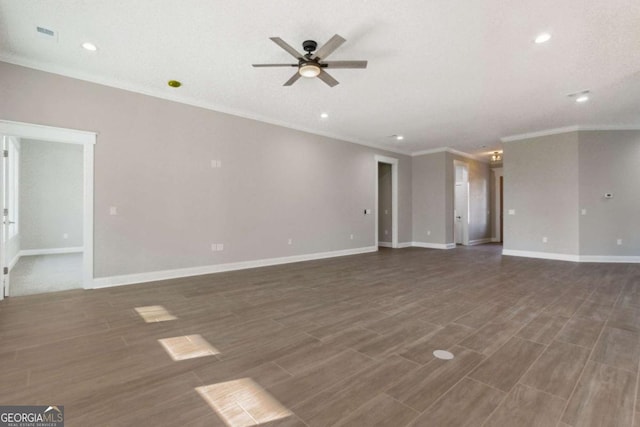 unfurnished living room featuring baseboards, a ceiling fan, dark wood-style flooring, crown molding, and recessed lighting