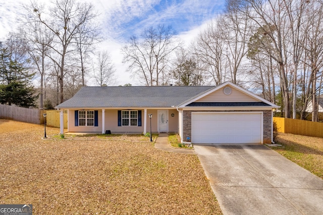 single story home with driveway, an attached garage, fence, and roof with shingles