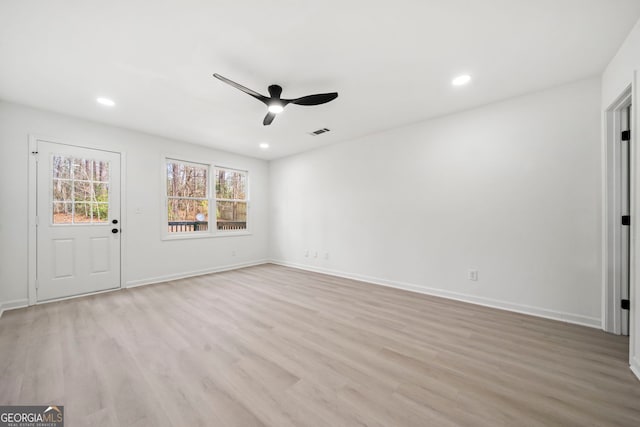 unfurnished living room featuring baseboards, recessed lighting, light wood-style flooring, and a ceiling fan