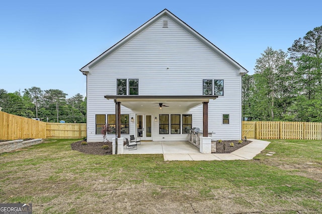 1523 Grayson Pkwy, Grayson, GA 30017 - back of house with ceiling fan, a patio, a fenced backyard, and french doors