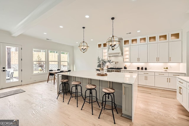 living room featuring light wood-type flooring and recessed lighting