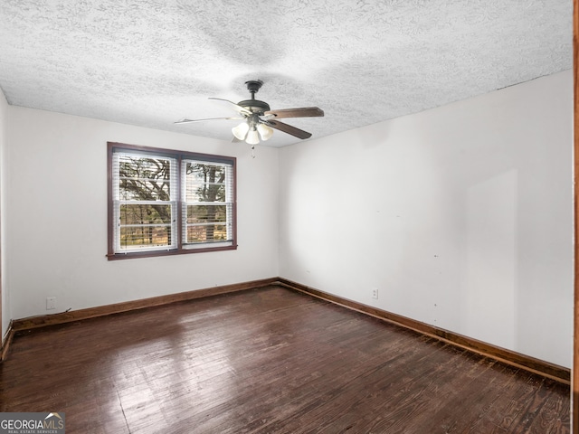 1713 Bramlett Shoals Rd, Lawrenceville, GA 30045 - spare room with dark wood finished floors, a ceiling fan, and a textured ceiling