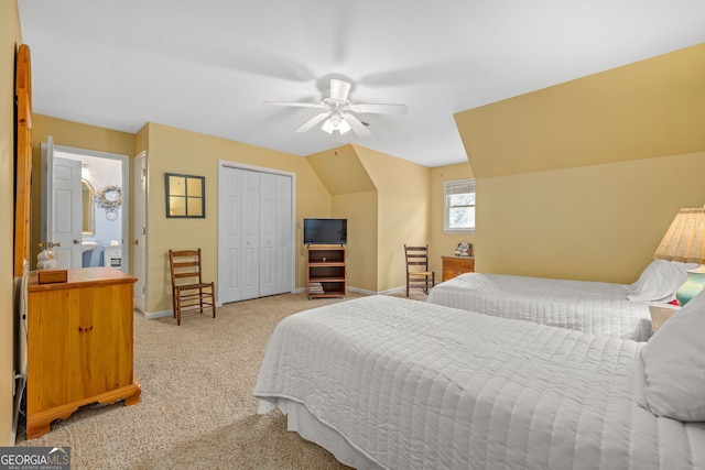 bedroom with light carpet, a closet, baseboards, and a ceiling fan